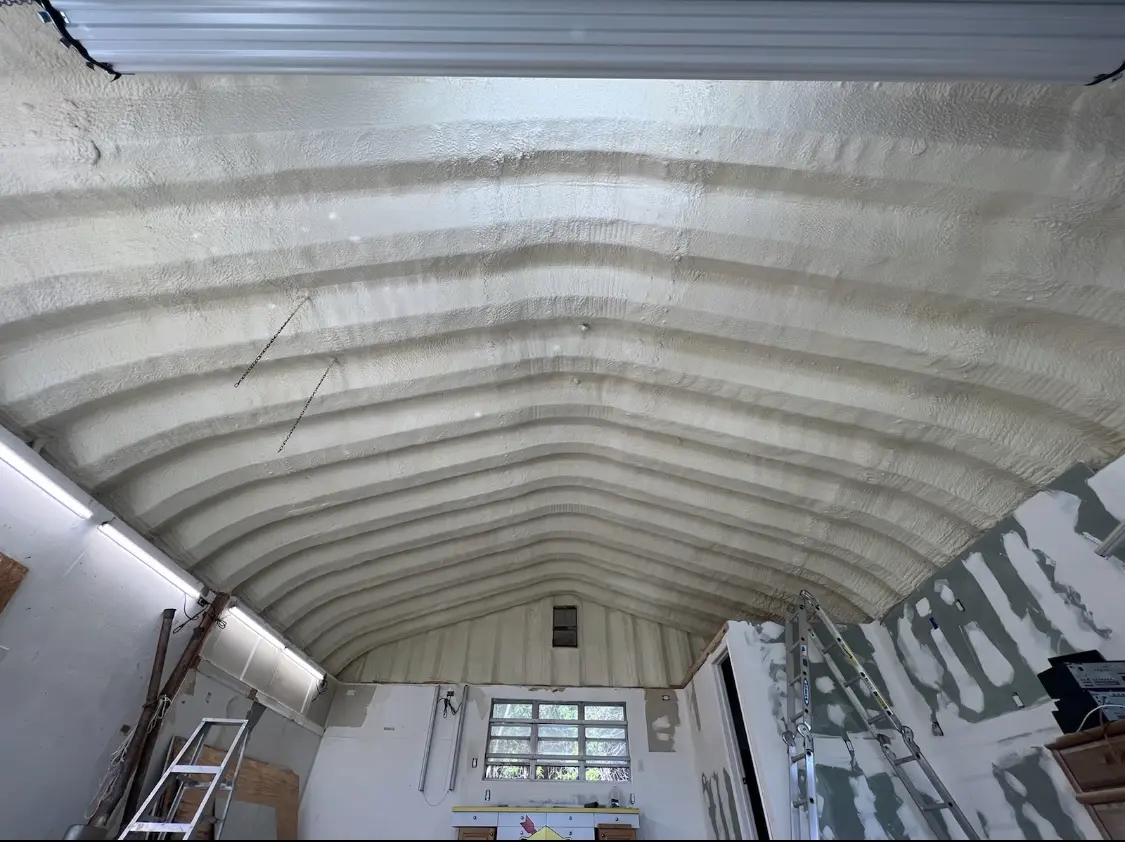 Spray polyurethane foam applied to the underside of a metal roof deck in Southbury